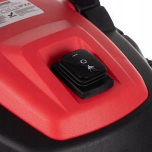 a close up of a red and black lawnmower