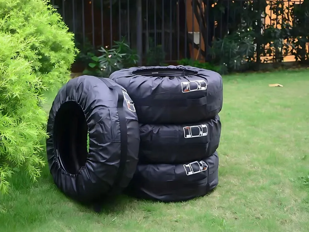 Set of four car tire covers with handles
